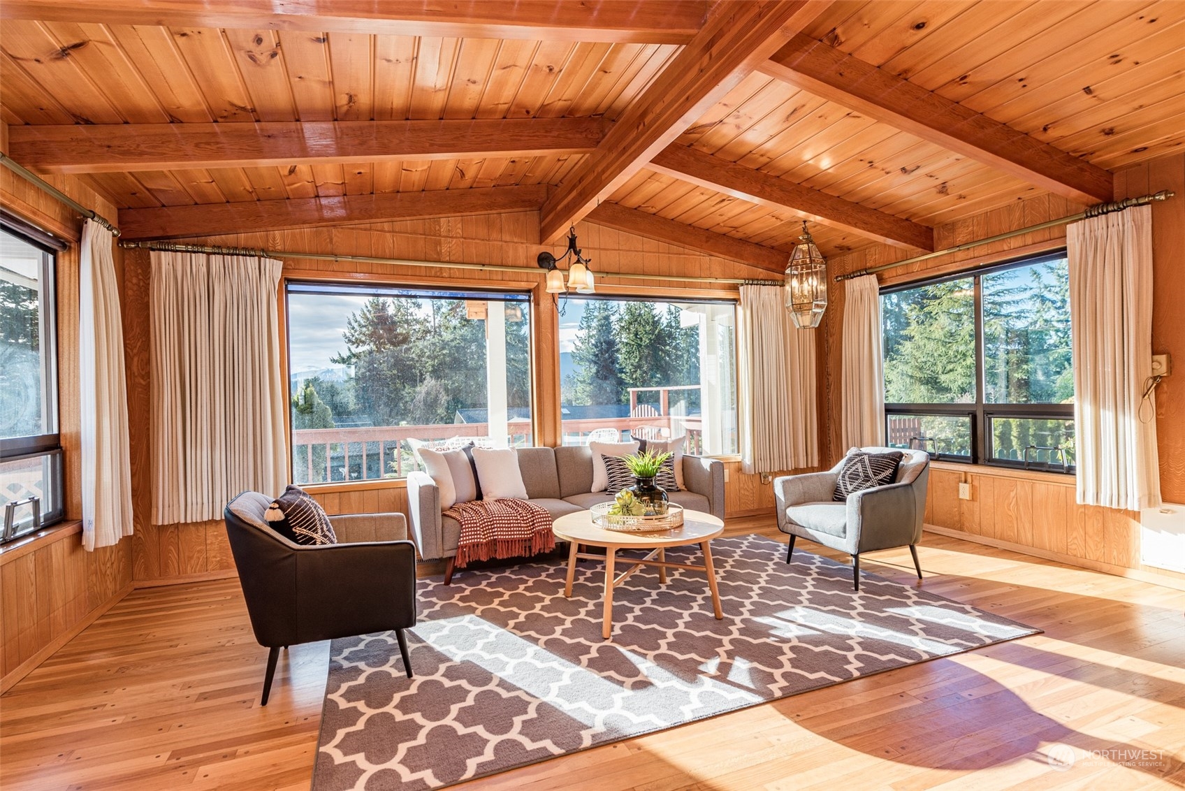 126 Hogans Vista Sequim, WA 98382 - Photo 11 of 40 a living room with furniture and a large window
