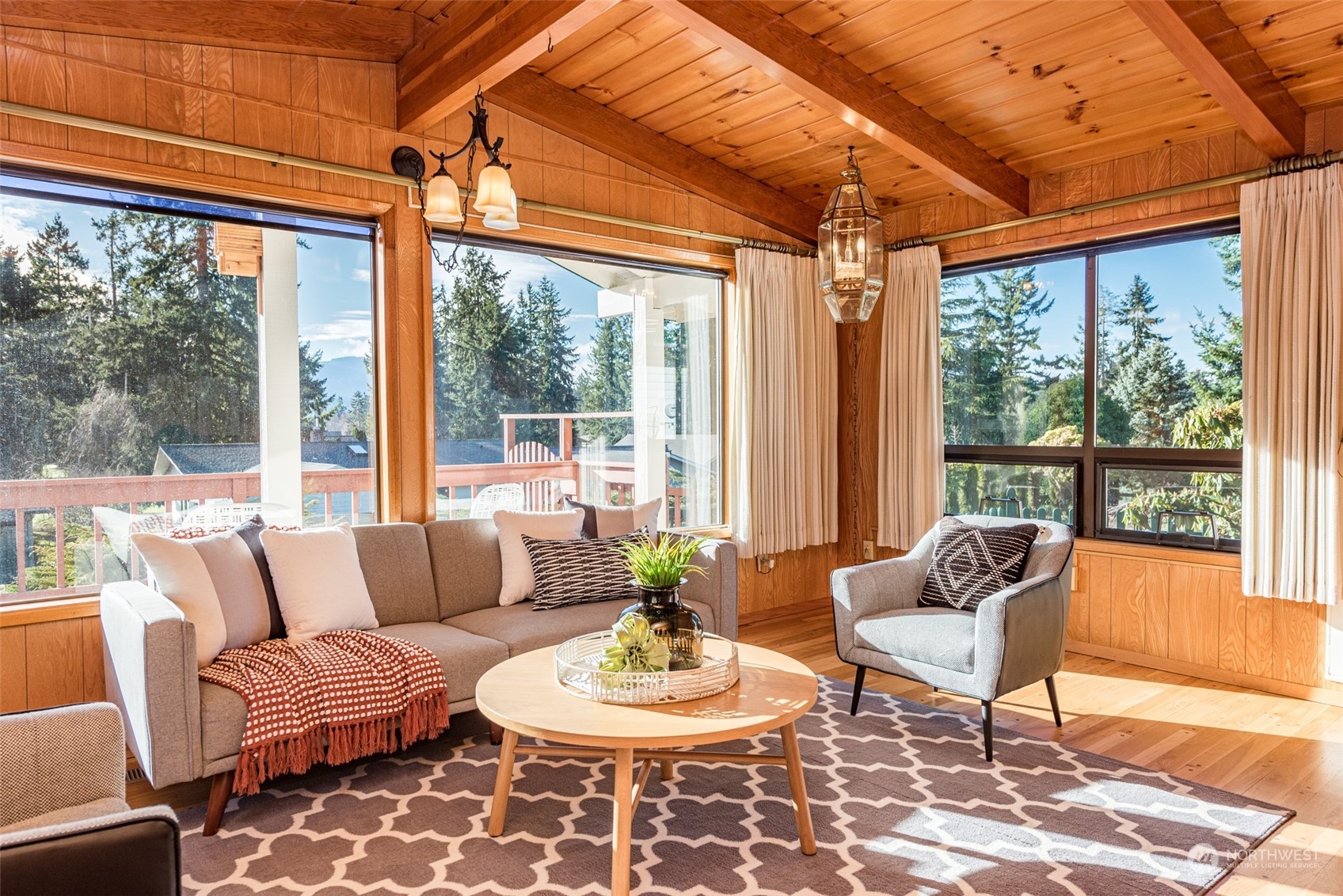 126 Hogans Vista Sequim, WA 98382 - Photo 12 of 40 a living room with furniture and a large window