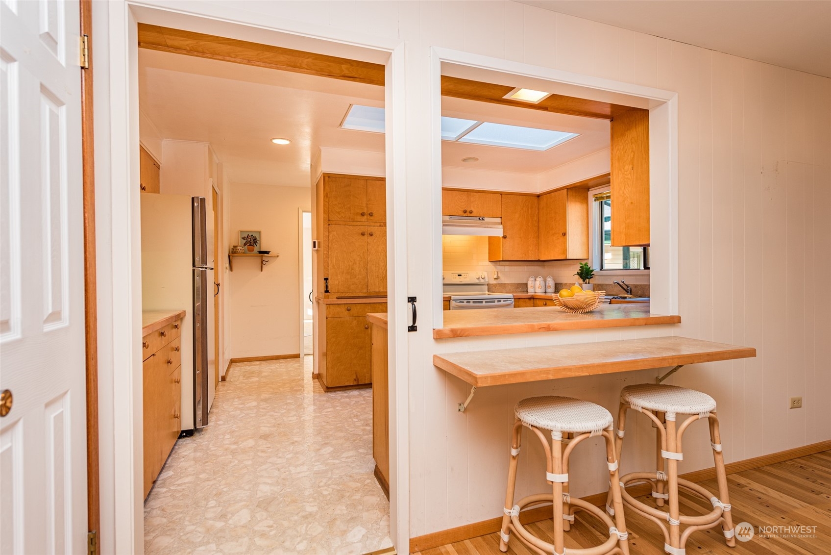 126 Hogans Vista Sequim, WA 98382 - Photo 18 of 40 a view of a kitchen from a dining room
