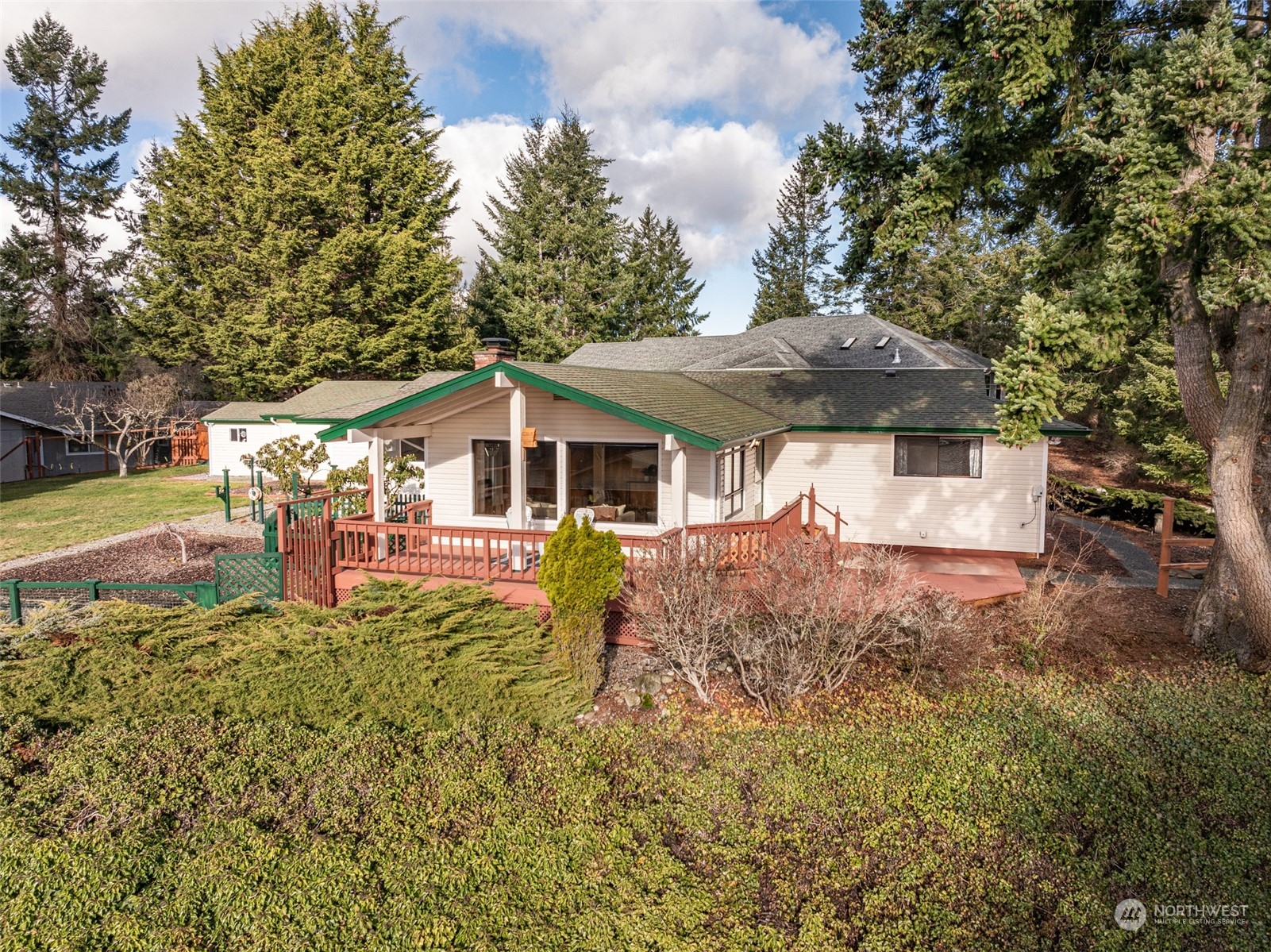 126 Hogans Vista Sequim, WA 98382 - Photo 2 of 40 a front view of a house with garden