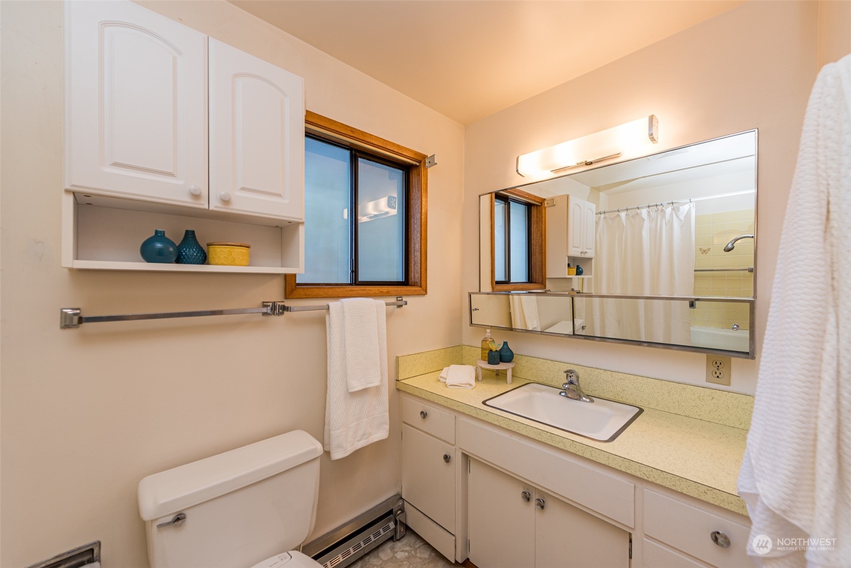 126 Hogans Vista Sequim, WA 98382 - Photo 23 of 40 a bathroom with a sink toilet and mirror