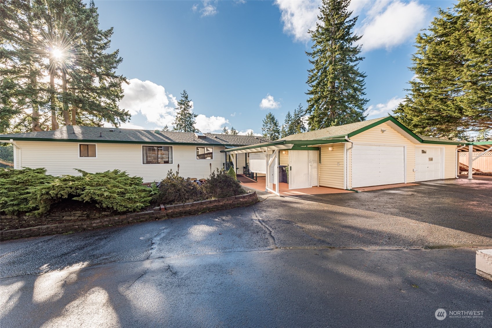 126 Hogans Vista Sequim, WA 98382 - Photo 33 of 40 a view of a house with a backyard and garden
