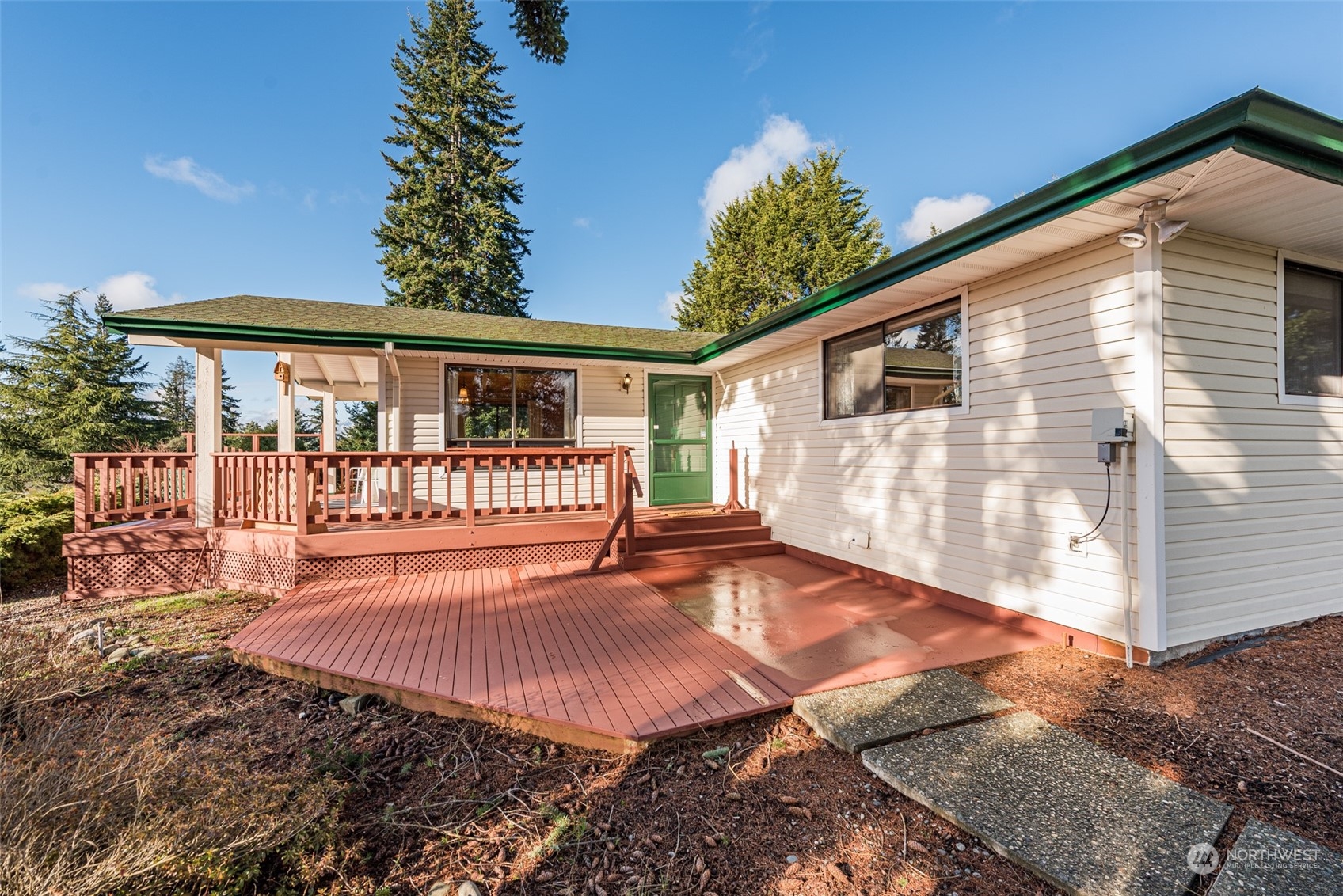 126 Hogans Vista Sequim, WA 98382 - Photo 34 of 40 a view of a house with wooden floor and a yard