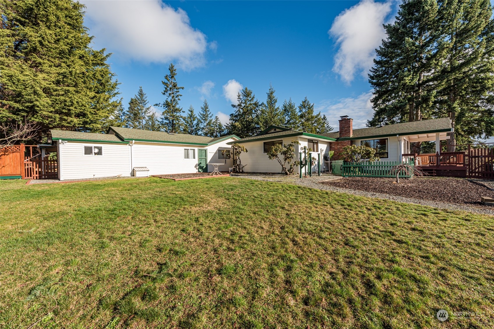 126 Hogans Vista Sequim, WA 98382 - Photo 35 of 40 a front view of a house with garden