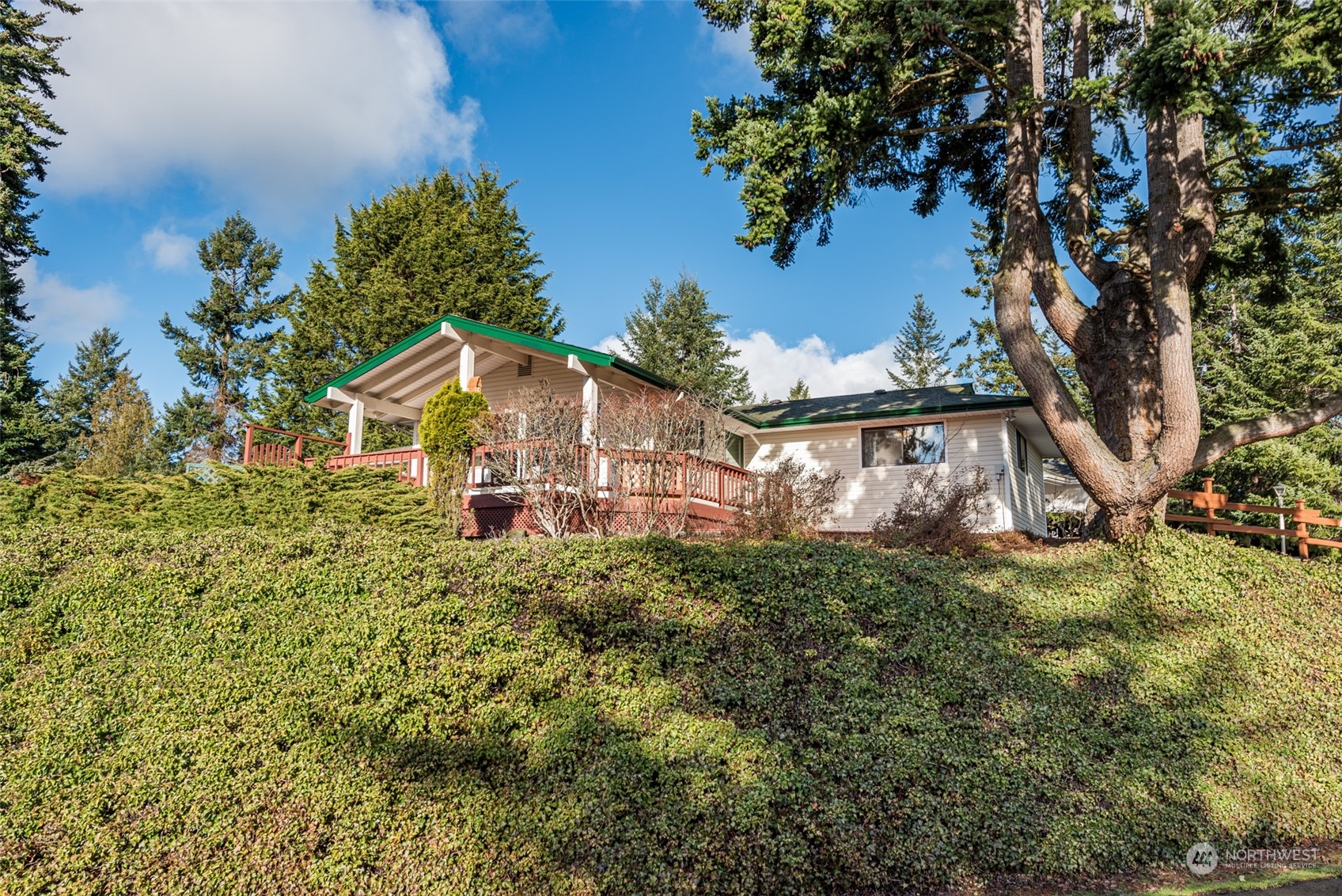 126 Hogans Vista Sequim, WA 98382 - Photo 40 of 40 an aerial view of a house with a yard