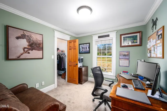 a view of a hallway with wooden shelves