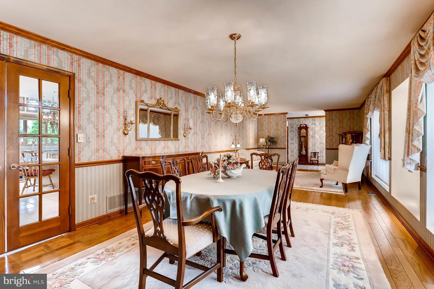 14000 Baldwin Mill Road Baldwin, MD 21013 - Photo 6 of 28 a view of a dining room with furniture window and wooden floor