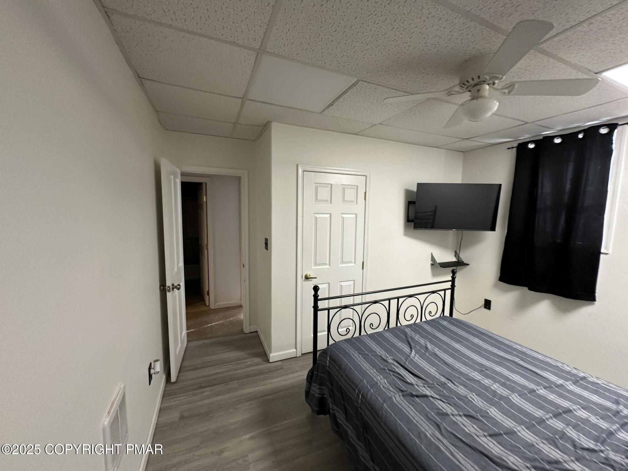 2656 Woodruff Lane, Unit B Stroudsburg, PA 18360 - Photo 5 of 8 a view of a livingroom with furniture and flat screen tv