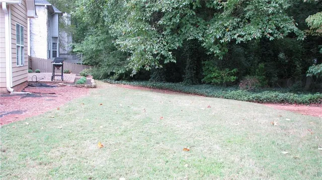 a view of a backyard of a house
