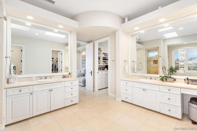 a bathroom with a tub and shower
