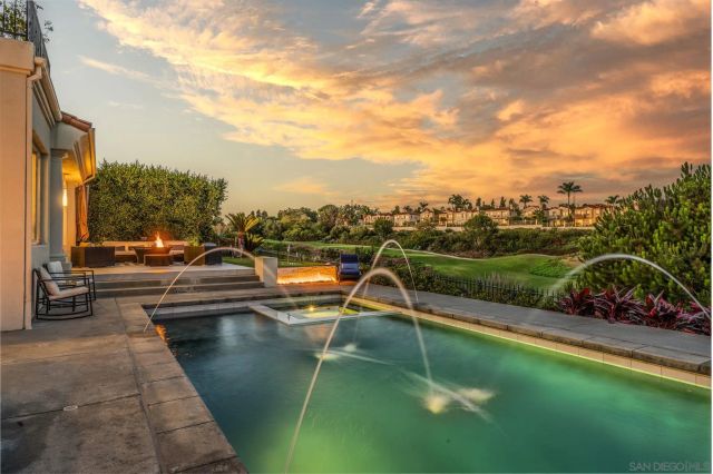 a view of a lake with a yard