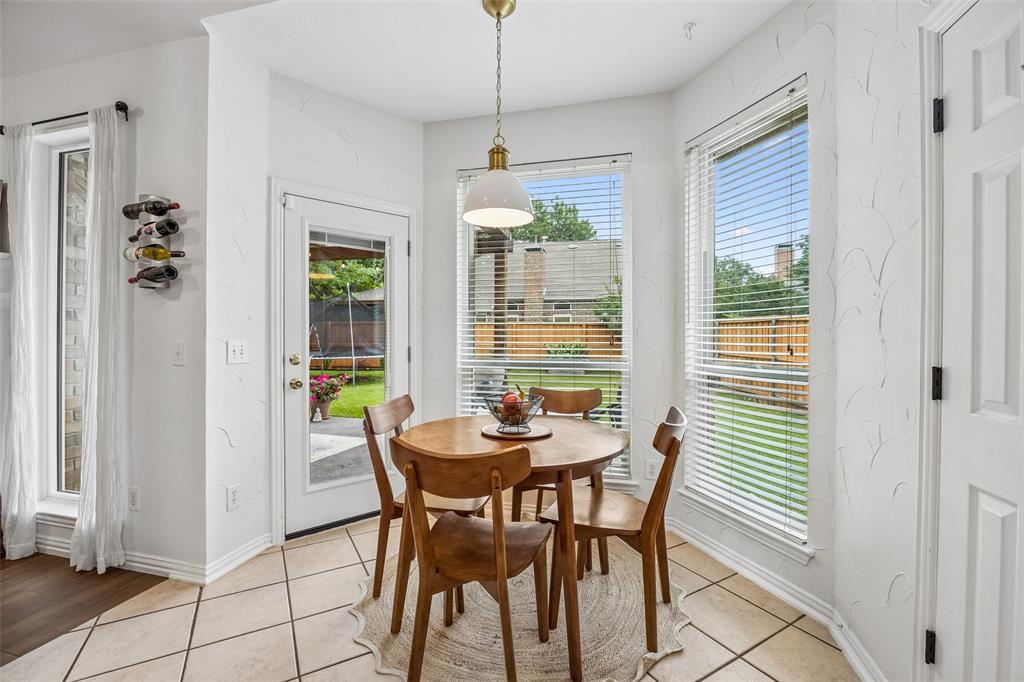 5511 South Briar Ridge Circle McKinney, TX 75072 - Photo 19 of 35 a dining room with furniture and window
