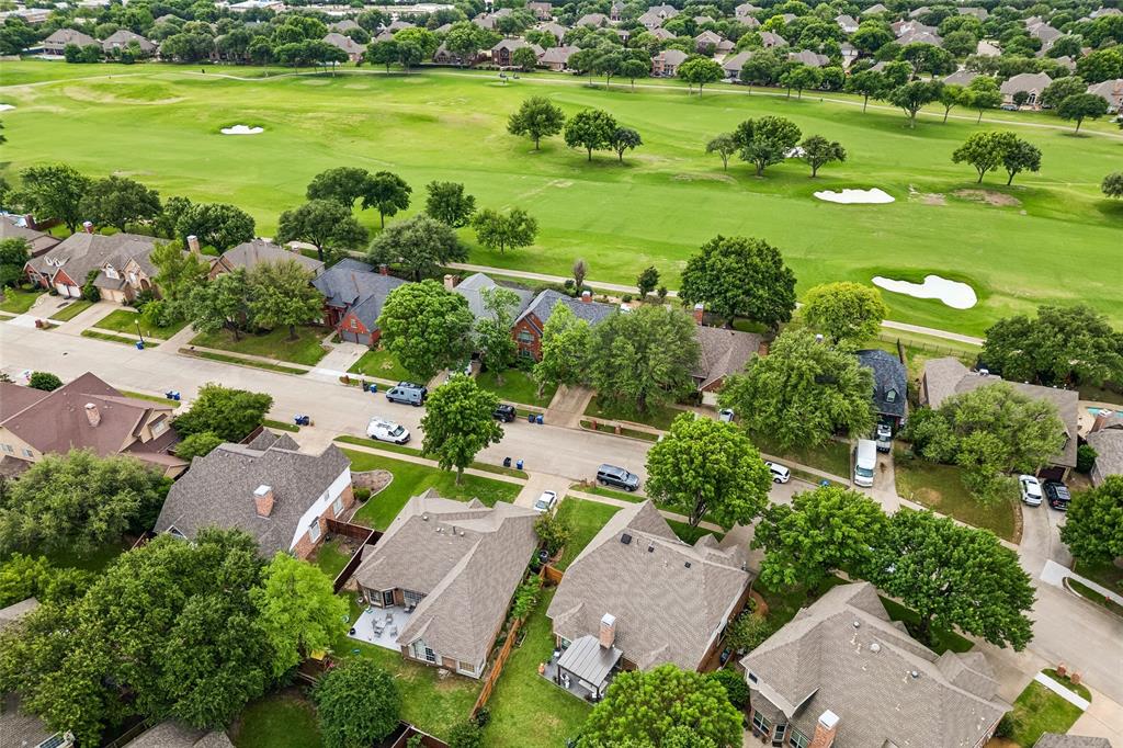 5511 South Briar Ridge Circle McKinney, TX 75072 - Photo 30 of 35 an aerial view of a houses with outdoor space and street view