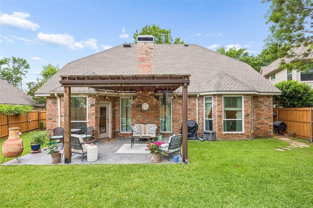 5511 South Briar Ridge Circle McKinney, TX 75072 - Photo 34 of 35 a view of a house with sitting area and garden