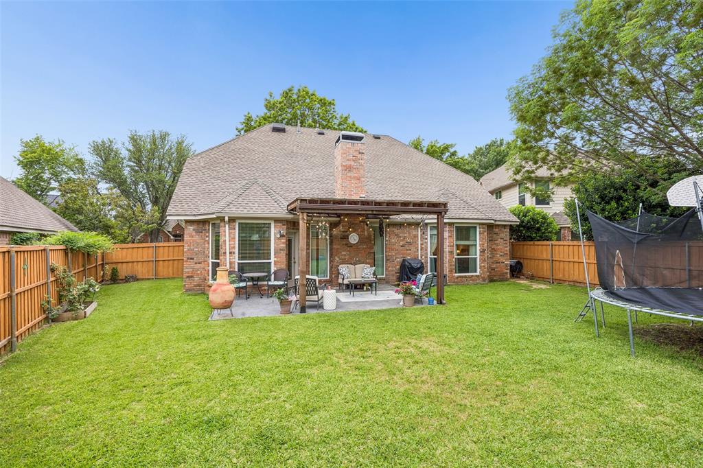 5511 South Briar Ridge Circle McKinney, TX 75072 - Photo 35 of 35 a view of a house with a yard porch and sitting area