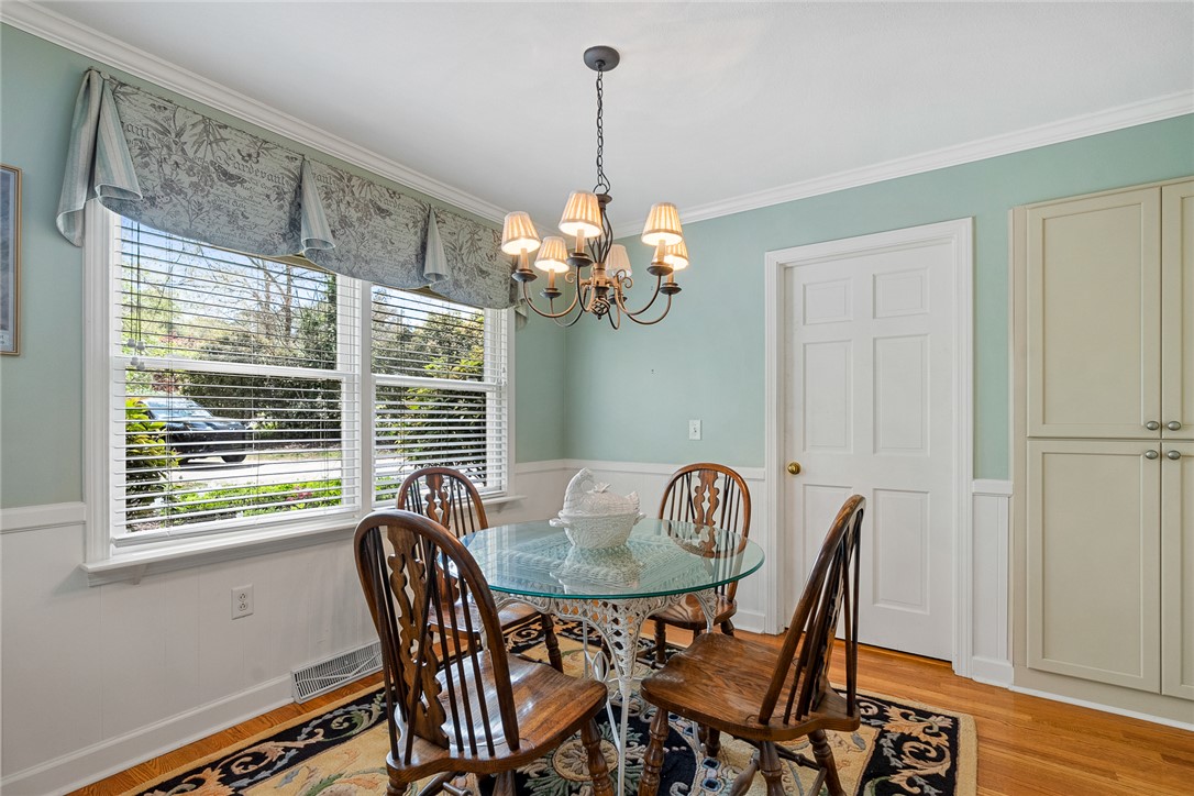 1211 Melbourne Drive Anderson, SC 29621 - Photo 16 of 35 This bright dining area features ample natural light and elegant hardwood floors.
