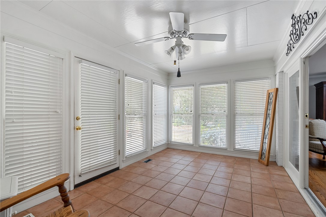 1211 Melbourne Drive Anderson, SC 29621 - Photo 18 of 35 This bright sunroom offers abundant natural light and a comfortable space for relaxation.