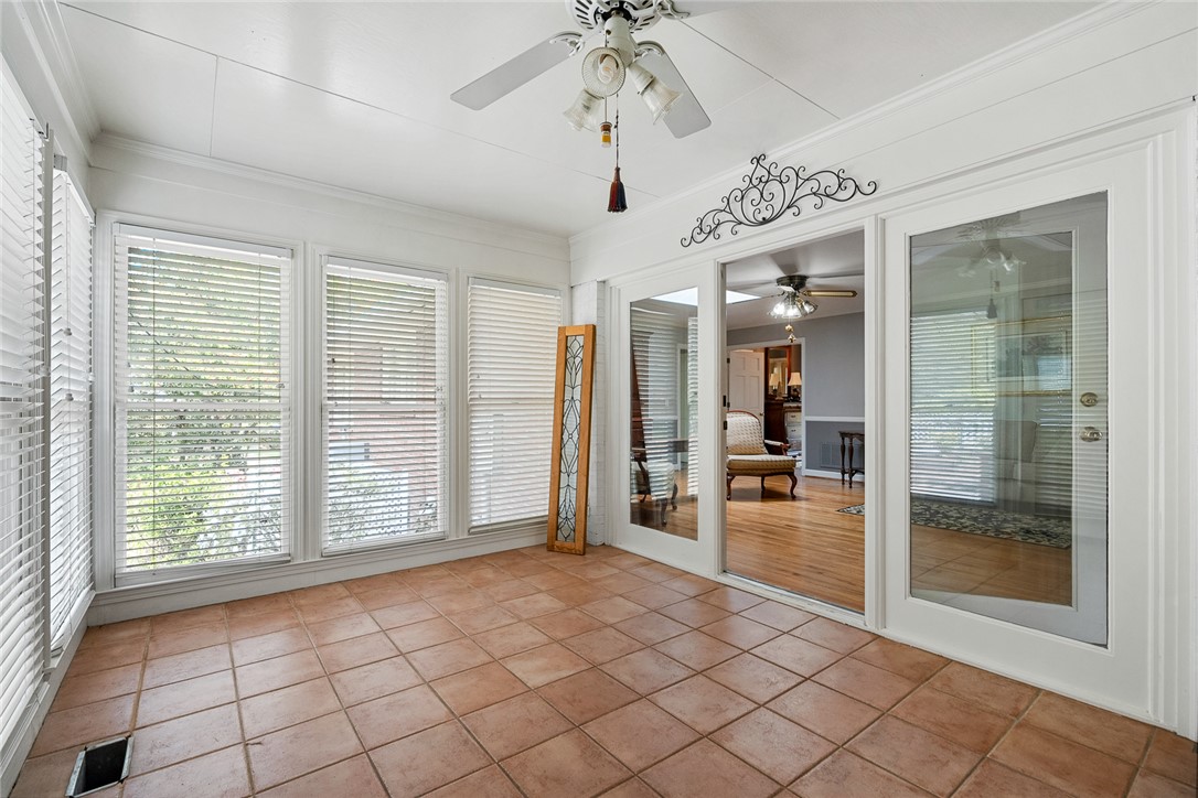 1211 Melbourne Drive Anderson, SC 29621 - Photo 19 of 35 This sunroom offers an inviting retreat, with abundant natural light and easy access to adjacent living spaces.