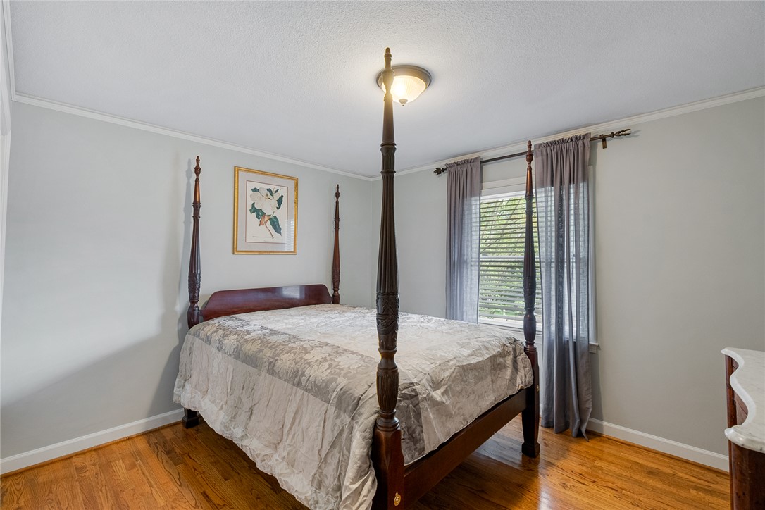 1211 Melbourne Drive Anderson, SC 29621 - Photo 24 of 35 This cozy bedroom offers rich hardwood flooring and abundant natural light.