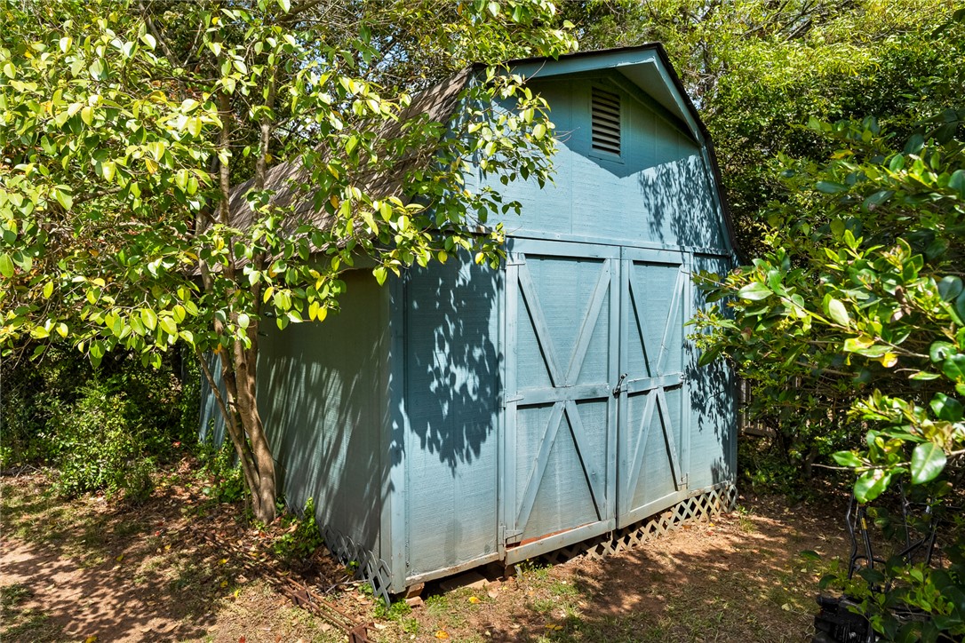 1211 Melbourne Drive Anderson, SC 29621 - Photo 32 of 35 This outdoor shed offers convenient extra storage for all your gardening needs.
