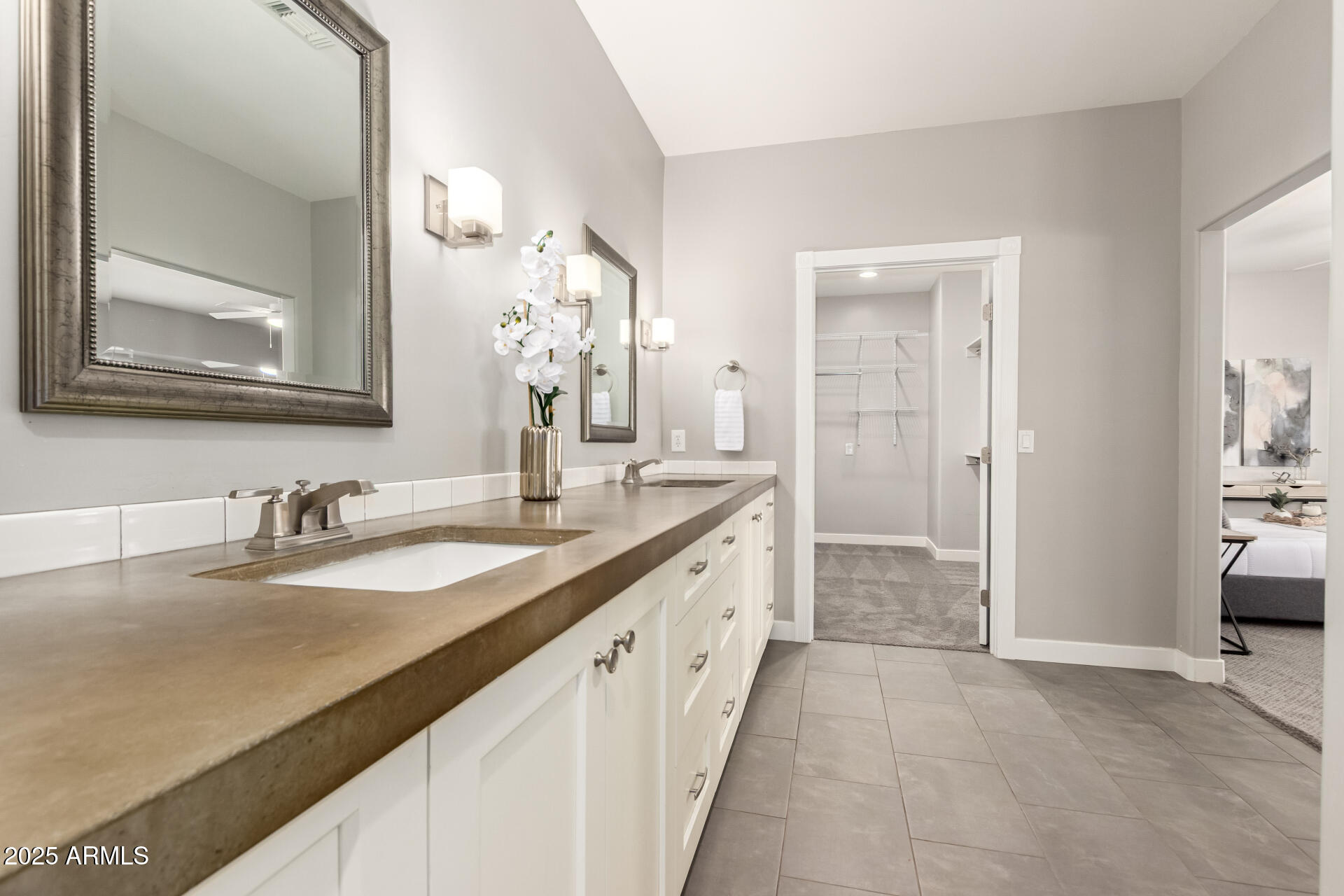 943 East Kortsen Road, Unit 10 Casa Grande, AZ 85122 - Photo 20 of 35 a spacious bathroom with a sink and a mirror
