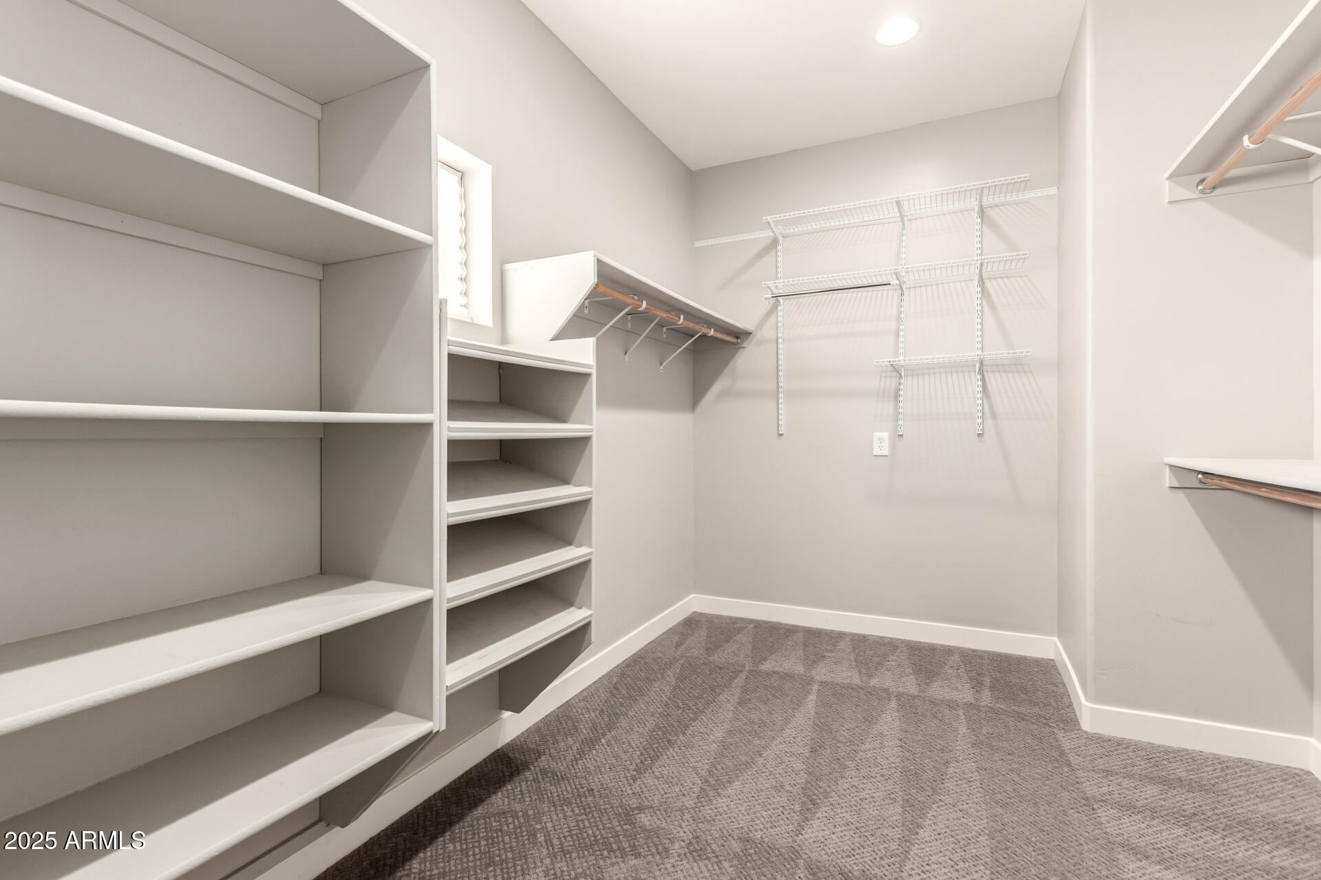 943 East Kortsen Road, Unit 10 Casa Grande, AZ 85122 - Photo 23 of 35 a view of walk in closet with empty racks