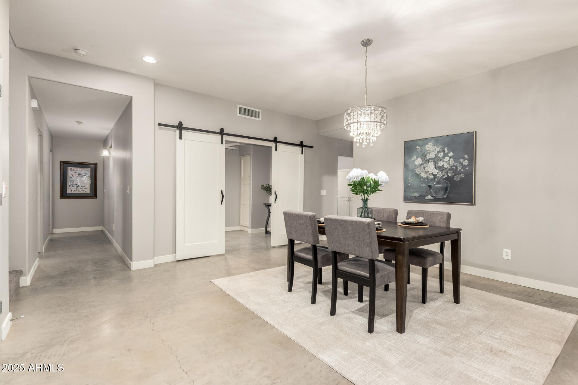 943 East Kortsen Road, Unit 10 Casa Grande, AZ 85122 - Photo 10 of 35 a view of a dining room with furniture window and wooden floor