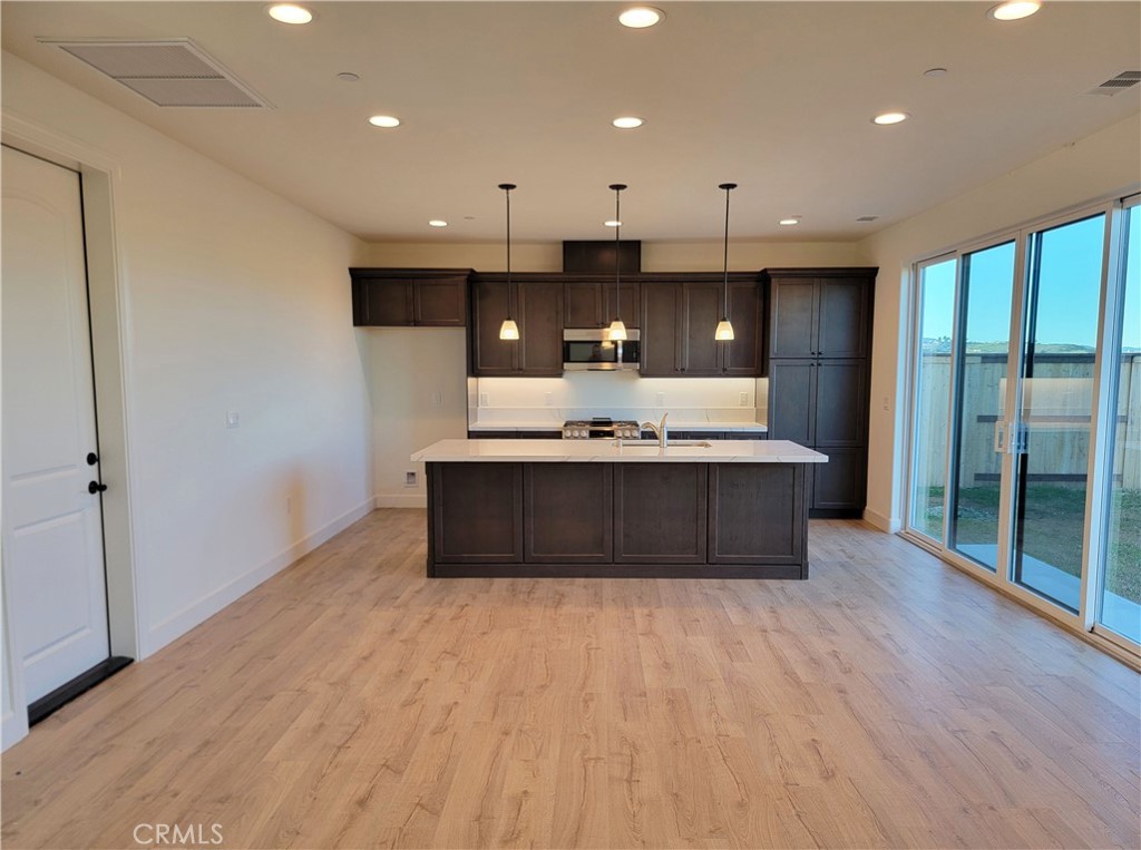 725 Manor Lane Paso Robles, CA 93446 - Photo 4 of 29 a large bathroom with a large tub and sink