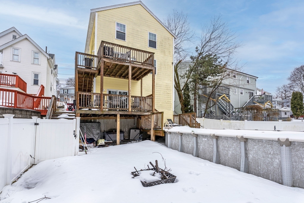 74 Linwood Street Lynn, MA 01905 - Photo 34 of 37 a view of a house with a sink and sitting area
