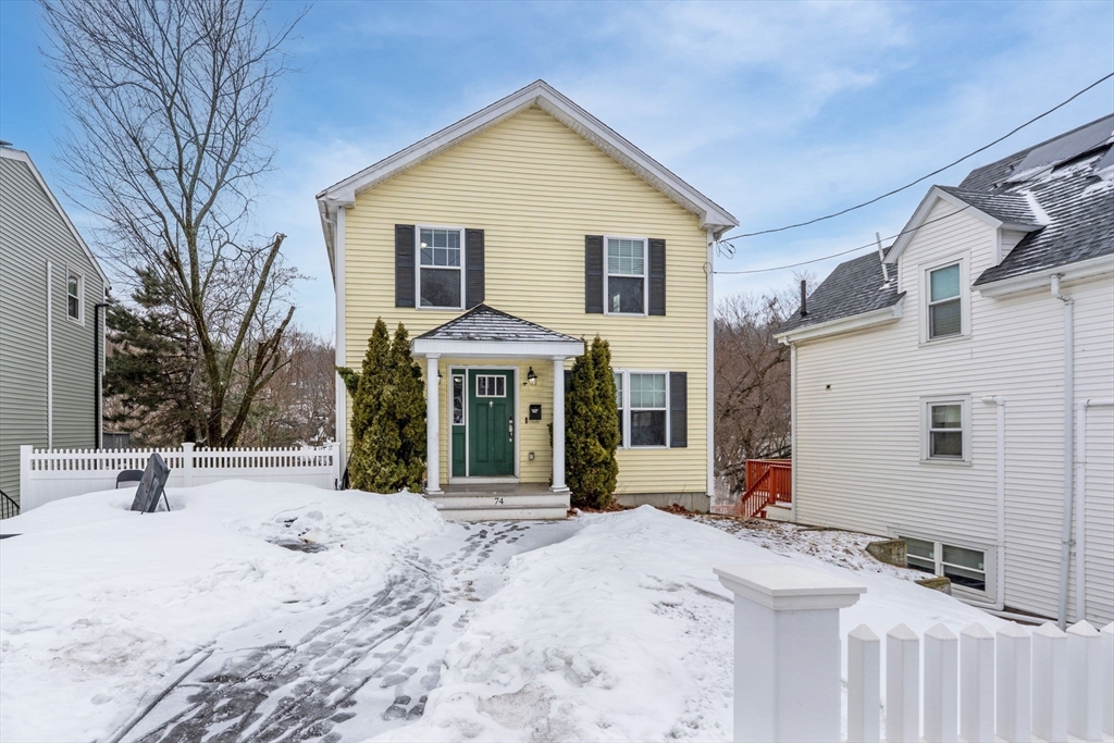 74 Linwood Street Lynn, MA 01905 - Photo 36 of 37 a view of a white house with snow on the road