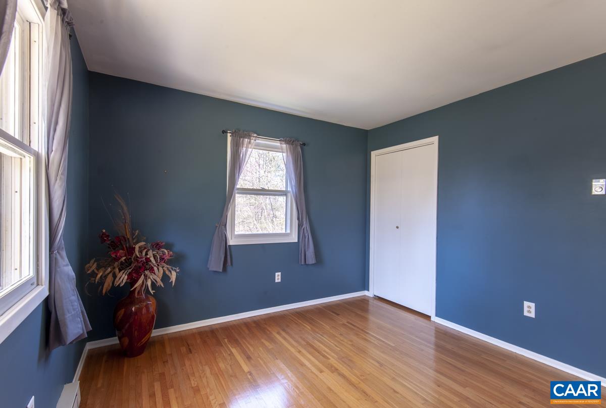 801 Poplar Spring Road Scottsville, VA 24590 - Photo 11 of 44 a workspace with wooden floor