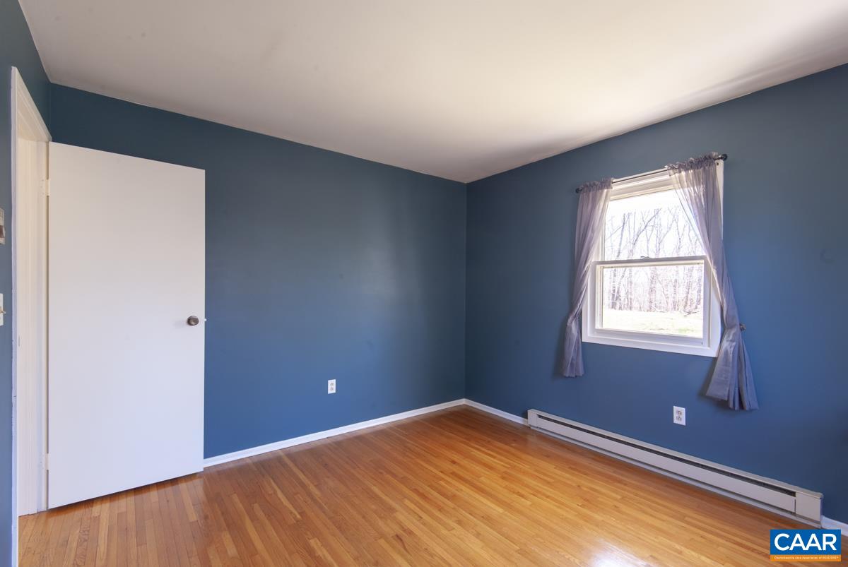 801 Poplar Spring Road Scottsville, VA 24590 - Photo 12 of 44 a view of empty room with window