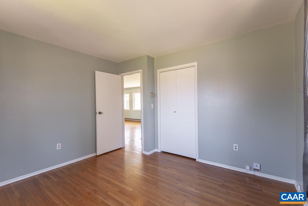 801 Poplar Spring Road Scottsville, VA 24590 - Photo 14 of 44 a view of an empty room and wooden floor