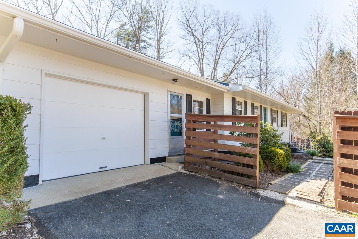 801 Poplar Spring Road Scottsville, VA 24590 - Photo 29 of 44 a view of a house with a yard