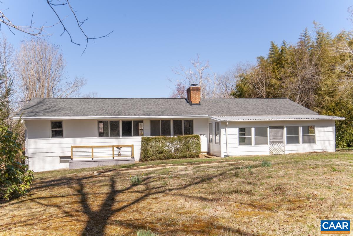 801 Poplar Spring Road Scottsville, VA 24590 - Photo 33 of 44 a front view of a house with a yard