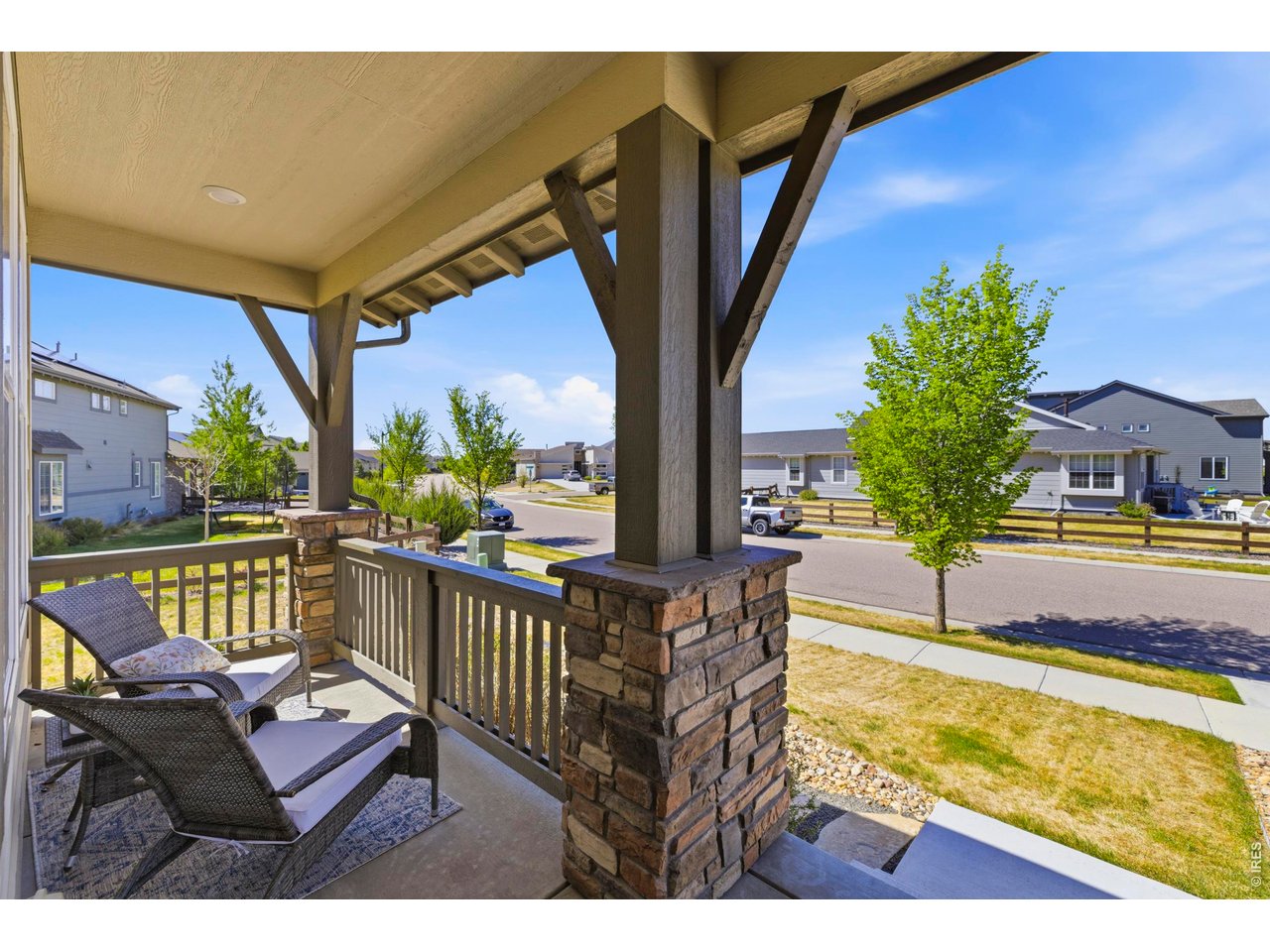 2910 Water View Street Timnath, CO 80547 - Photo 3 of 50 a view of a balcony with chairs