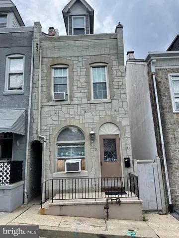 a front view of a house with a door