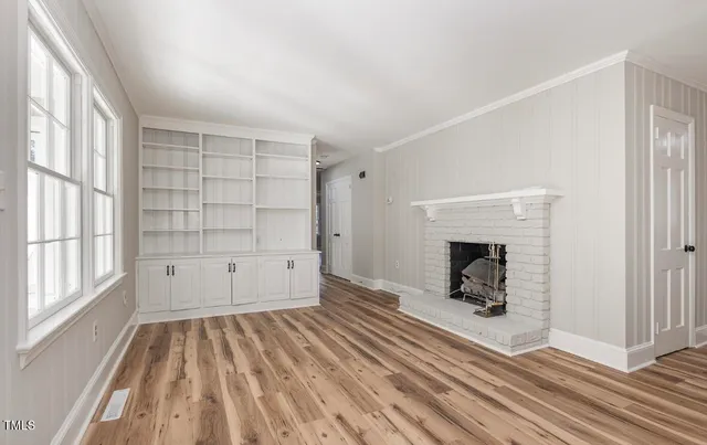 a view of livingroom with furniture and fireplace