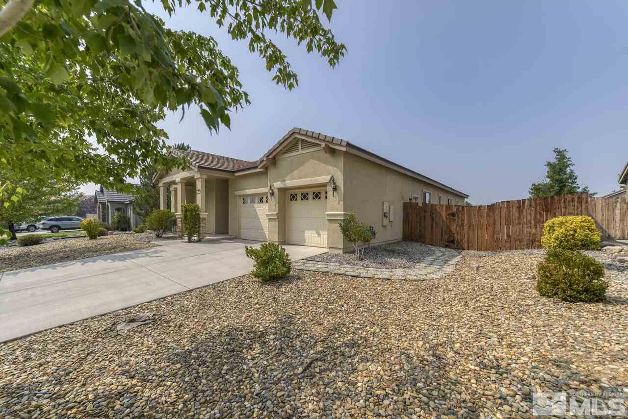2604 Mule Circle Reno, NV 89521 - Photo 3 of 40 a front view of a house with a yard