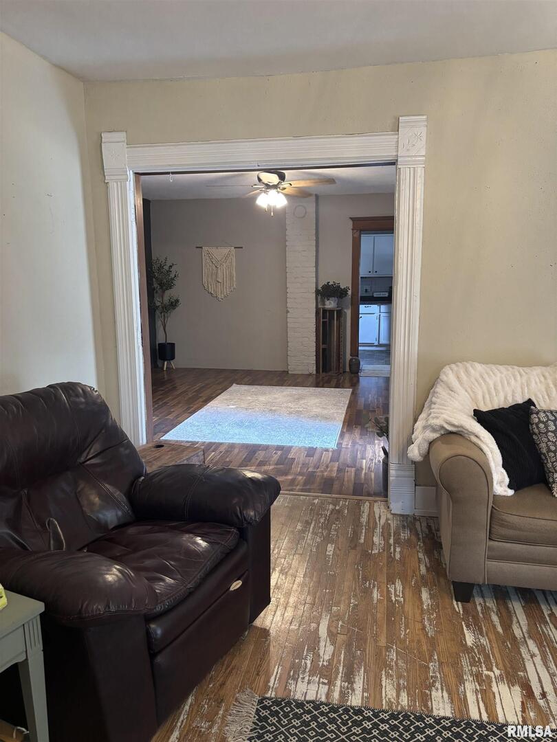 417 Northeast 2nd Avenue Galva, IL 61434 - Photo 21 of 62 a living room with furniture and a fireplace