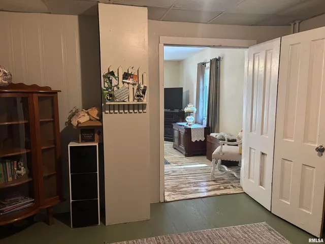 a view of balcony with wooden floor