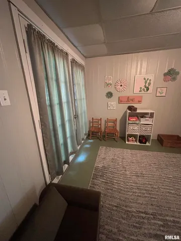 a view of staircase with wooden floor