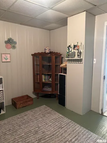 a refrigerator freezer sitting inside of a kitchen