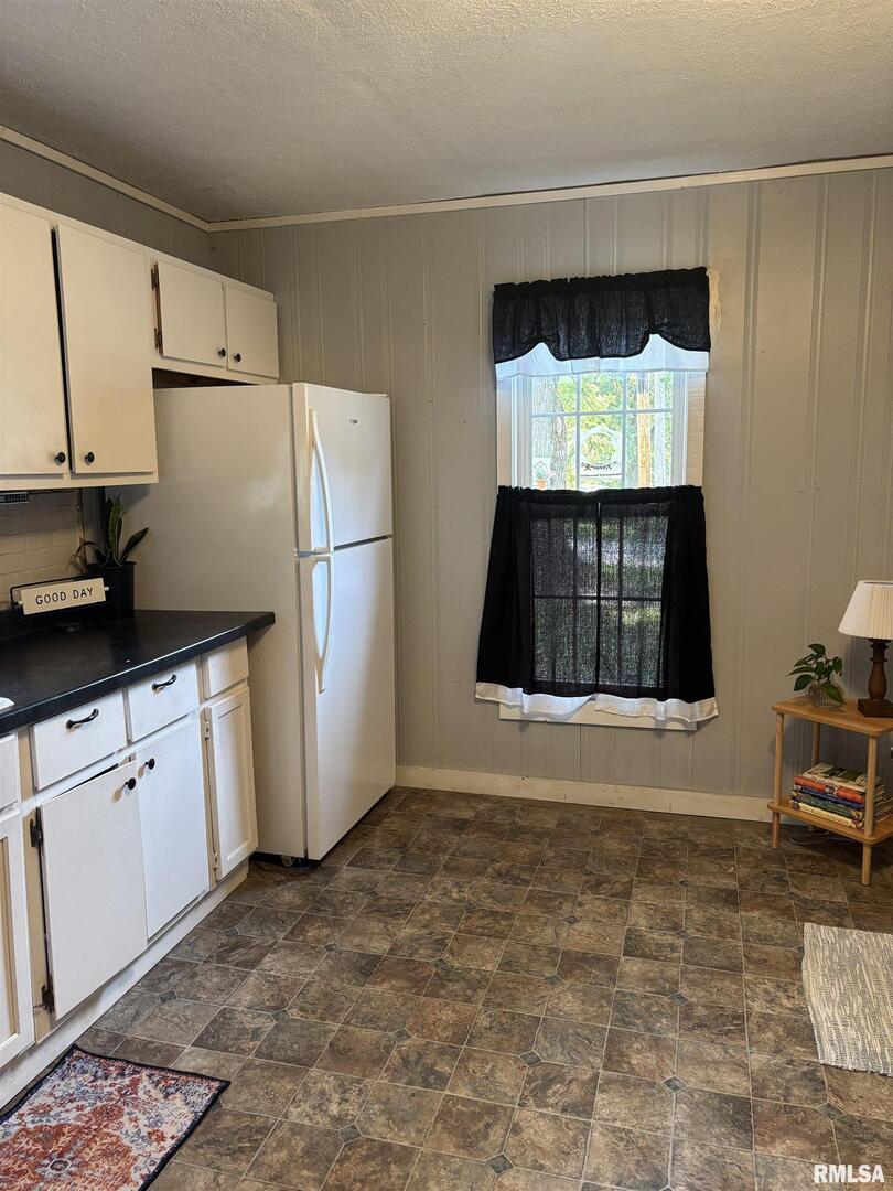 417 Northeast 2nd Avenue Galva, IL 61434 - Photo 33 of 62 a refrigerator freezer sitting inside of a kitchen