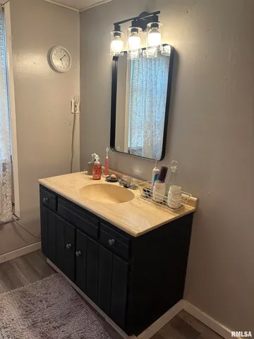 a bedroom with a bed and dresser