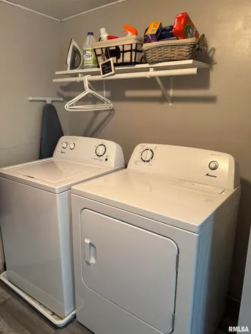 a view of a bed in a bedroom