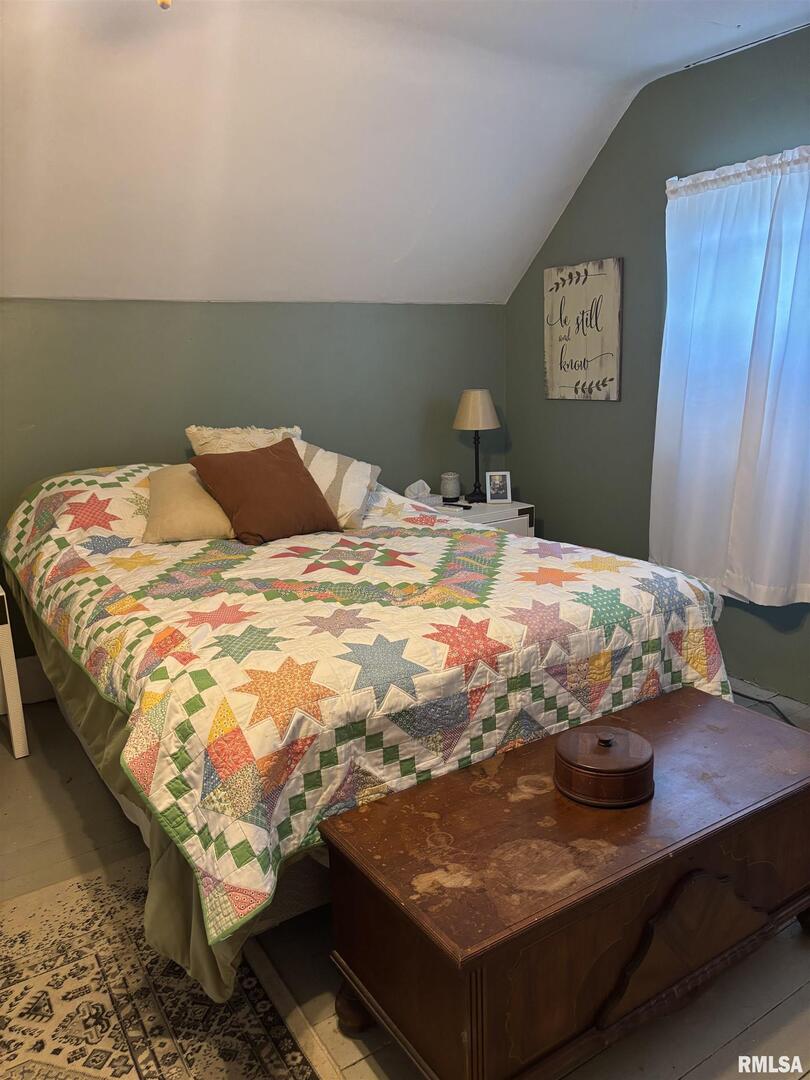 417 Northeast 2nd Avenue Galva, IL 61434 - Photo 42 of 62 a bed sitting in a bedroom with a bed