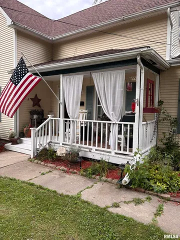 a house view with a garden space
