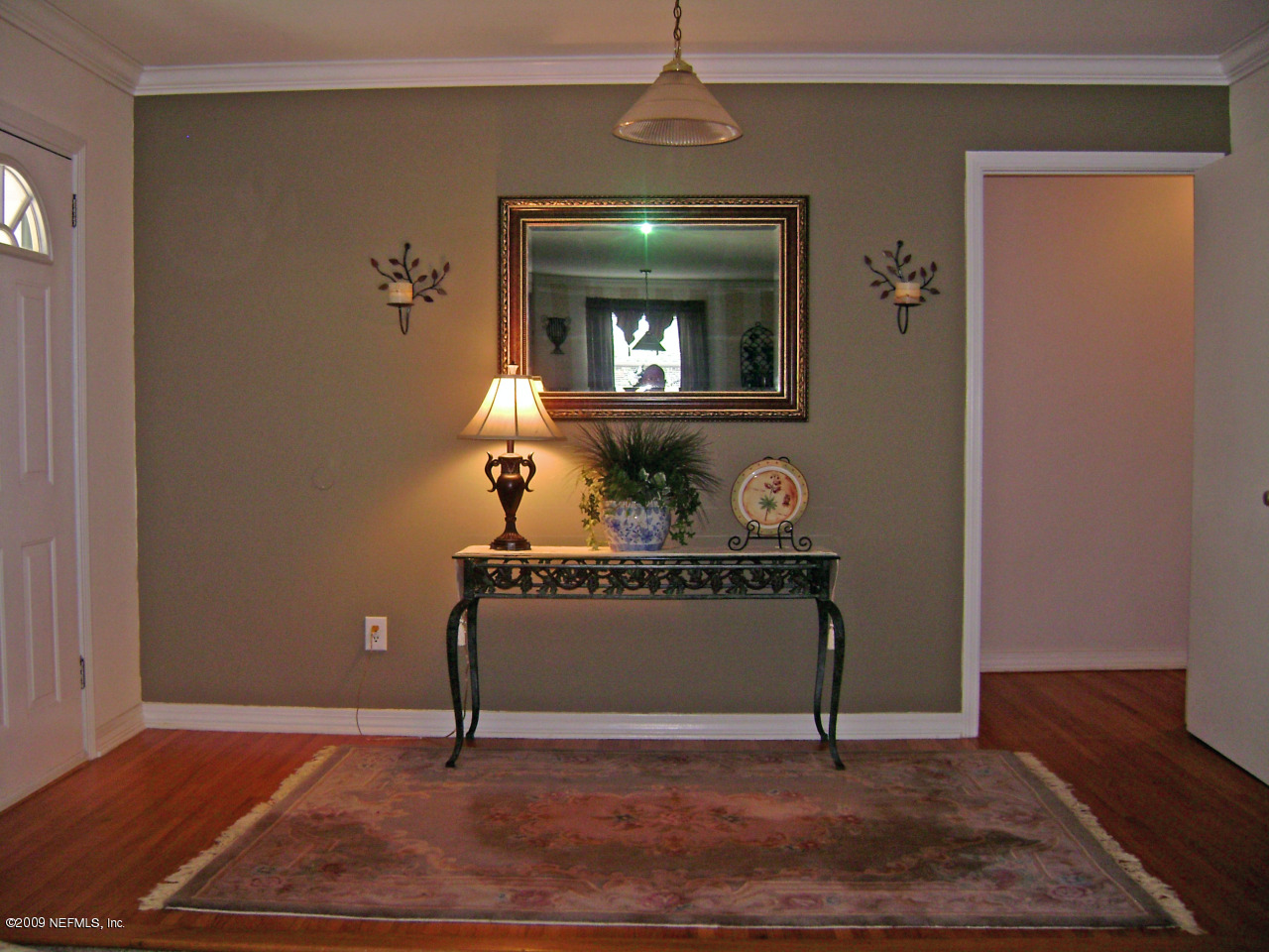 1165 Nicholson Road Jacksonville, FL 32207 - Photo 3 of 22 a view of an entryway with wooden floor