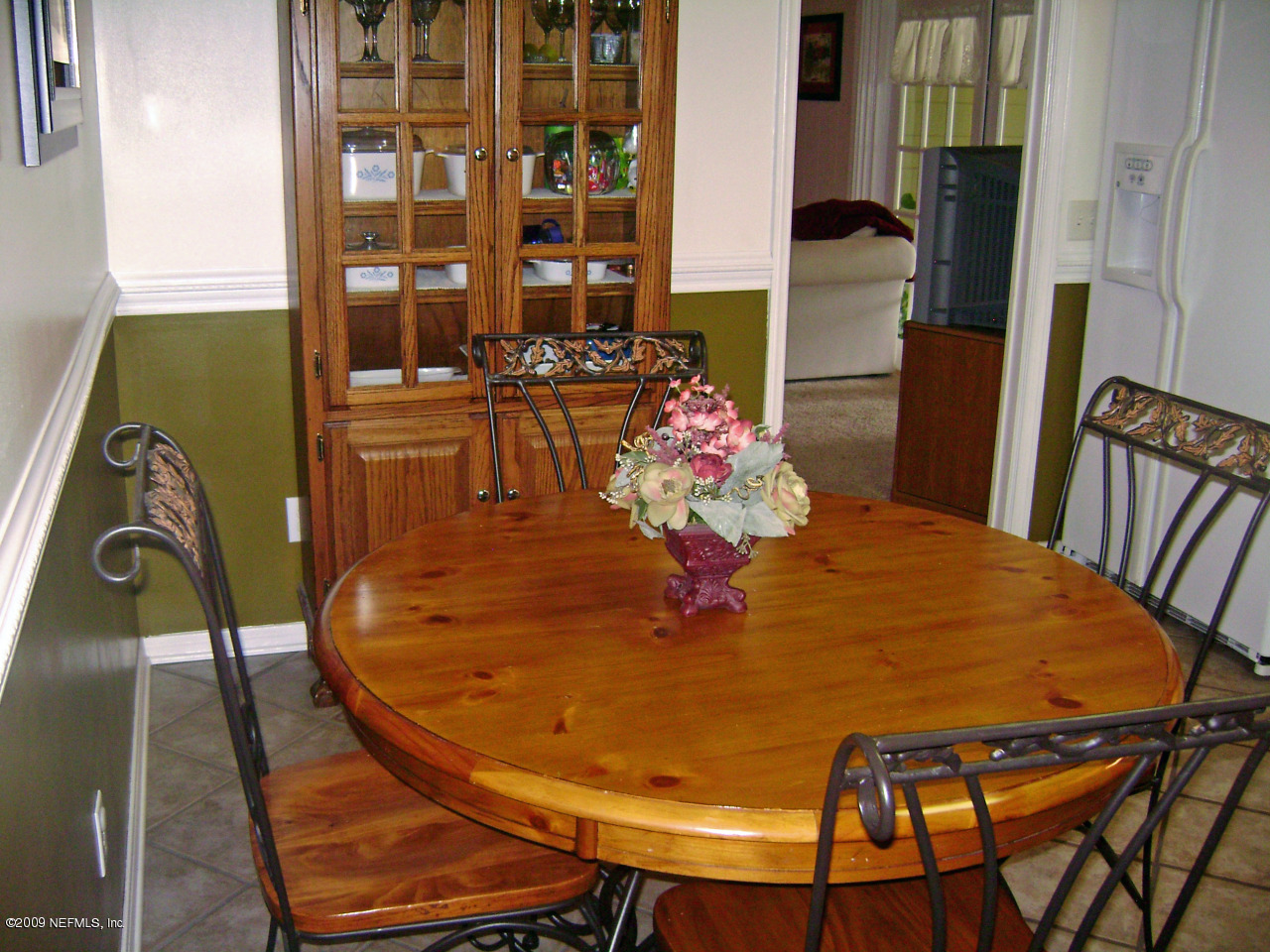 1165 Nicholson Road Jacksonville, FL 32207 - Photo 9 of 22 a dining table with chairs and wooden floor